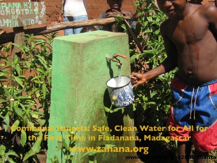 Boy with water cup in Madagascar