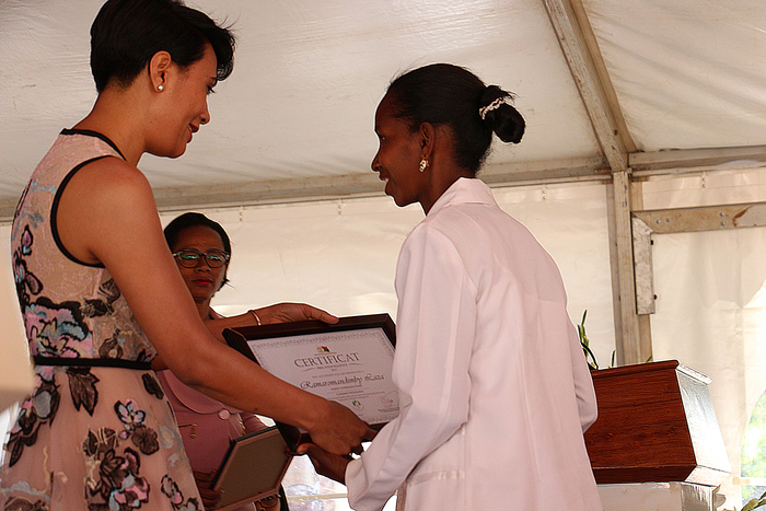 Handed the award of excellence by Madagascar's First Lady