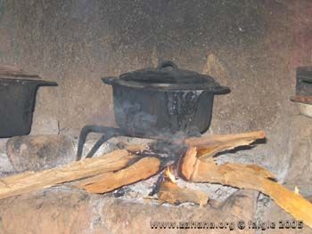 cookstove with rice cooking
