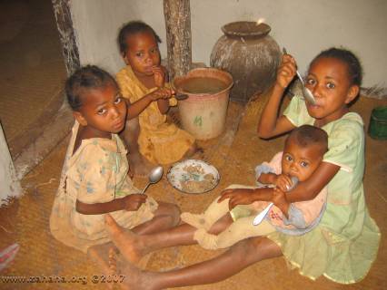 Children lucky enough to get rice for breakfast