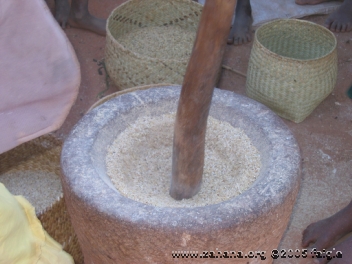 Rice in a stone mortar close-up in Madagascar - zahana photo