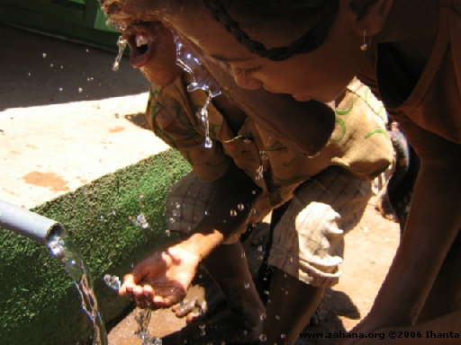 children touching the fresh water 3