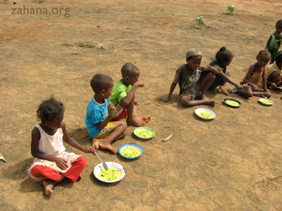eating soup in the school yard in madagascar